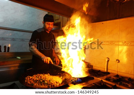Istanbul, Turkey - June 14: A Chef Cooking Traditional Turkish Food \'Sac Kebab\' On June 14, 2012 In Istanbul, Turkey.