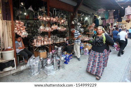 HATAY, TURKEY - AUGUST 21: Turkish women shopping in historical place \'Uzun Carsi\', on August 21, 2011 in Hatay, Turkey. Uzun Carsi is oldest and one of the most important shopping certer in Hatay.