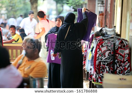 ISTANBUL, TURKEY - JULY 14: Arab tourists shopping at Taksim Square on July 14, 2011 in Istanbul, Turkey.