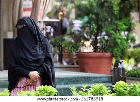 ISTANBUL, TURKEY - JULY 14: Arab woman at Taksim Square on July 14, 2011 in Istanbul, Turkey.