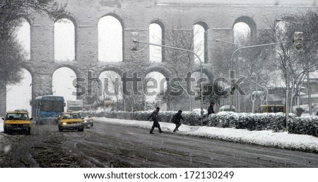 ISTANBUL, TURKEY - JANUARY 23: People trying to go to work on a snowy day in Fatih District on January 23, 2007 in Istanbul, Turkey.