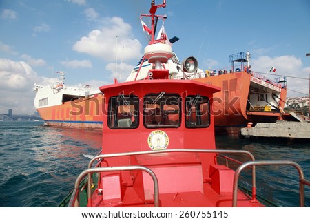 ISTANBUL, TURKEY - FEBRUARY 18: Bosphorus Sea Guide Captain going in industrial ship on February 18, 2013 in Istanbul, Turkey.