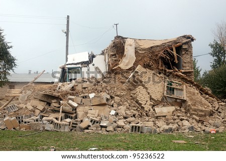 ERCIS, TURKEY-OCTOBER 25: Earthquake damage in Ercis, Van, Turkey. Destroyed adobe house after earthquake. October 25, 2011.