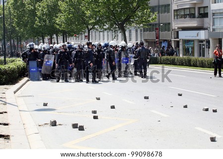ISTANBUL, TURKEY - MAY 1: International Workers Day. Police officers are preparing to protest on May 1, 2008 in Istanbul, Turkey. Taksim Square is the center of the protest and celebrations.