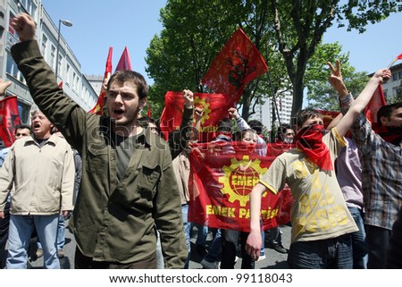 ISTANBUL, TURKEY - MAY 1: International Workers Day. Workers and socialist group walks in Istiklal Street on May 1, 2008 in Istanbul, Turkey. The event attracted thousands of labor protesters.