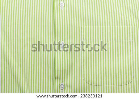 Green stripe men\'s shirt texture with buttons and pocket