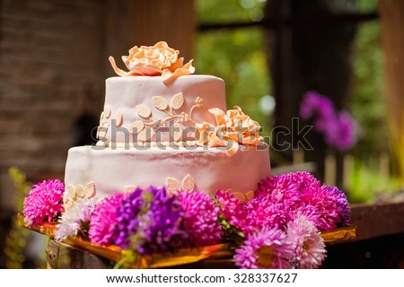 Traditional sweet. Wedding cake with flowers.