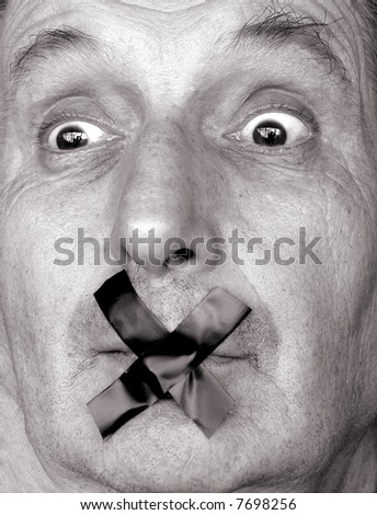 censure!stop talking! man with adhesive tape over his mouth. sepia tone