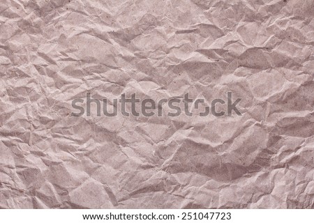 The texture of brown crumpled paper. Green technology, recycling paper. Background, texture of paper.