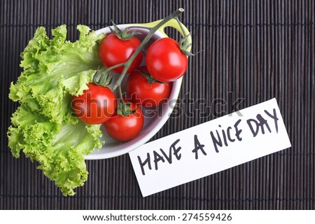Vegetables on the table. Diet food. Weight lose. Organic vegetables. The cherry tomatoes on a branch. Red tomatoes on a branch, lettuce. Vegetable Breakfast. Fresh vegetables. Vegetables in the pan.