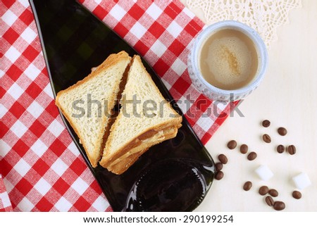 Morning Coffee. Toasts with bacon and cheese. Food and Drink. Coffee and lunch time. The atmosphere of inspiration and recreation. Stay for a Cup of coffee. Table of food. Still life food.