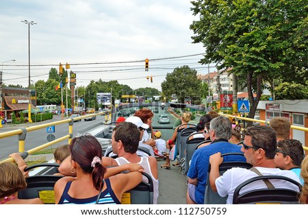 CONSTANTA, ROMANIA - AUGUST 8: Double-Decker tourist bus. These buses were put in Constance in 2007. Tour reaches many tourist attractions of resorts Constanta and Mamaia, Romania on August, 8, 2012.