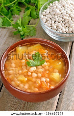 Bean soup in ceramic bowl