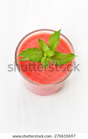 Watermelon cocktail with mint in glass, top view