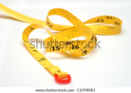 yellow measurement tape isolate on a white background