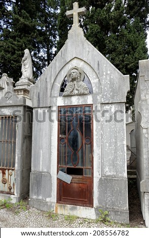 Abandoned cemetery chapel with her funeral urns inside