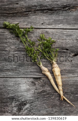 Organic parsley on a rustic wooden board