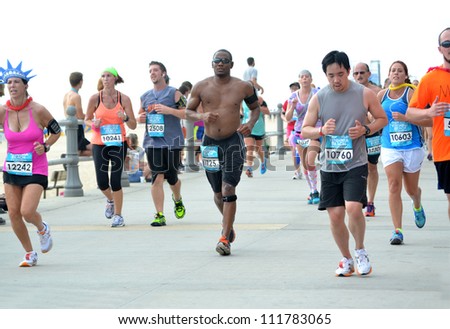 VIRGINIA BEACH, VIRGINIA-SEPTEMBER 2: Runners compete in the Rock N Roll Half Marathon on September 2, 2012 in Virginia Beach, Virginia