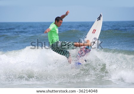 VIRGINIA BEACH, VA -  AUGUST 30, 2009: Rob Kelly competes at the 47th East Coast Surfing Championship on August 30, 2009 in Virginia Beach, Virginia.