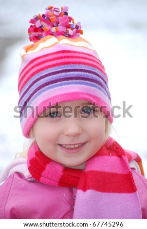 little girl outside in snow
