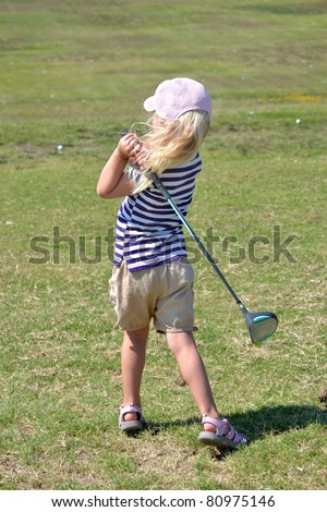 Little Girl Golfing