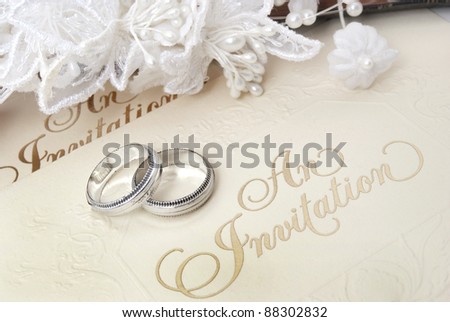 wedding rings and invite