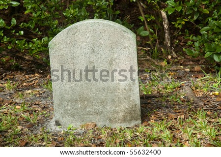 Empty tombstone on a graveyard