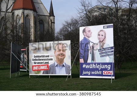 MAGDEBURG, GERMANY - FEBRUARY 19, 2016: Election Campaign posters of several parties for the state election in Saxony-Anhalt on 13 March 2016 the city of Magdeburg in Germany