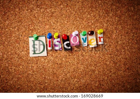 Discover - Cut out letters pinned on a notice board.