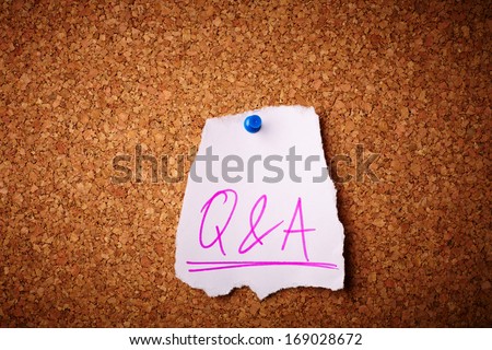 Question and Answer - Cut out letters pinned on a notice board.