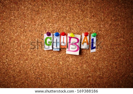 Global   - Cut out letters pinned on a cork notice board.