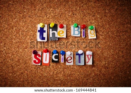 The big society - Cut out letters pinned on a cork notice board.