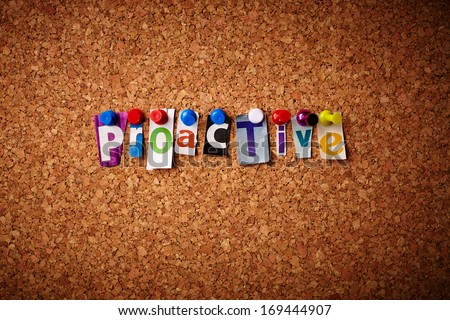 Proactive - Cut out letters pinned on a cork notice board.
