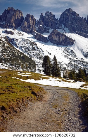 Hiking path in the mountains Image of the beautiful alps area.