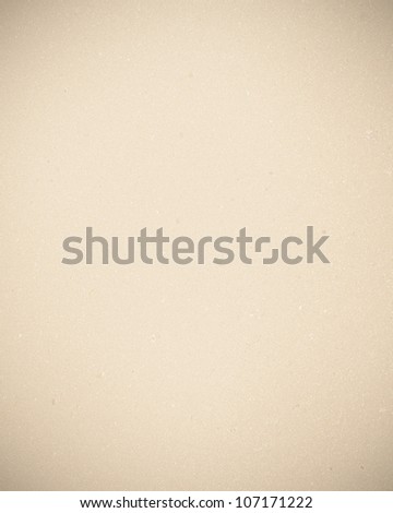 paper texture background in beige color and delicate vignette