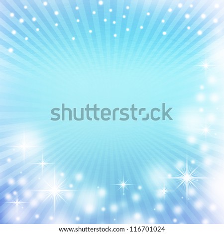 blue christmas background with rays of light, white snowflakes, sparkles and copy space for text