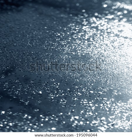 drops of water on metal texture background, wet surface blur background