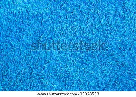 real blue carpet texture as background to design