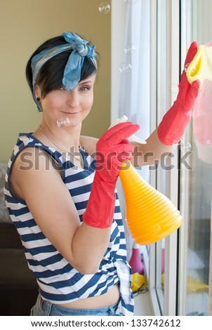 Woman clean the windows