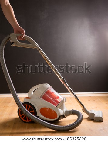 man who cleans the floor of the house