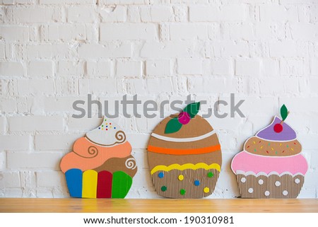 colored cakes handmade ?of paper on white background