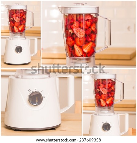 fresh strawberries in white Blender on a wooden table. kitchen