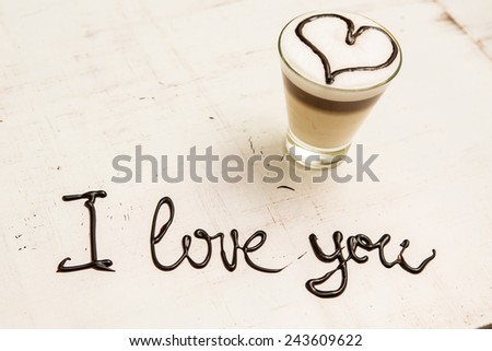 Love coffee cup and handwriting. I love you. Creative card