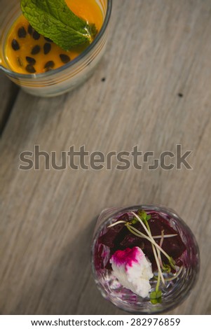 Vegetarian aperitif with beet, goat cheese and soy sprouts