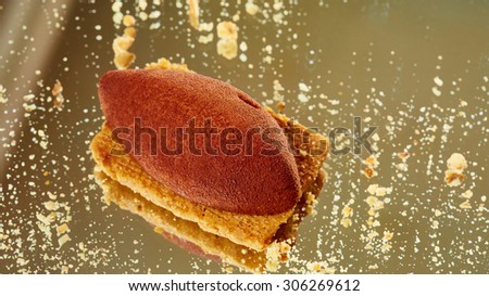 Chocolate mousse dessert on the mirror. Background with copy space.