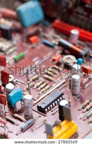 Macro picture of an electronic board with chips and other electronics components
