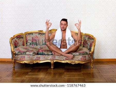 guy do yoga on sofa
