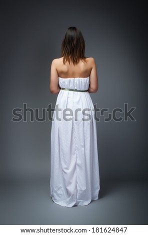 woman in bride dress back side