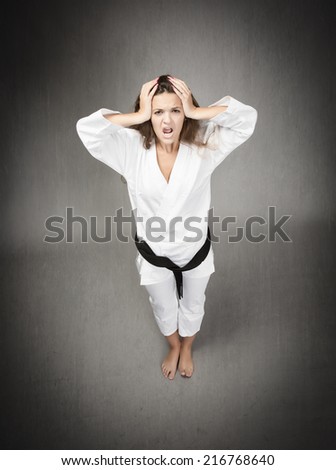 desperate girl with judo black belt