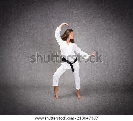 dancing in a judo uniform
